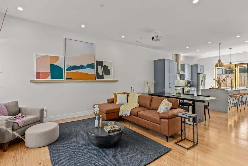 Relax in the airy living room with leather sectional, board games, and streaming TV.