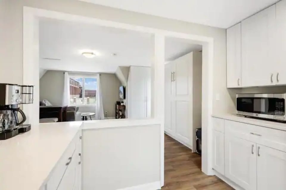 Kitchenette with Coffee Make, Microwave, Hot Plate. Slow Cooker, Sink and Fridge