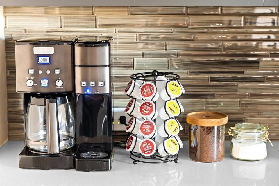 Coffee Bar | Morning Perfection Awaits Start your day with coffee at the fully stocked coffee bar.