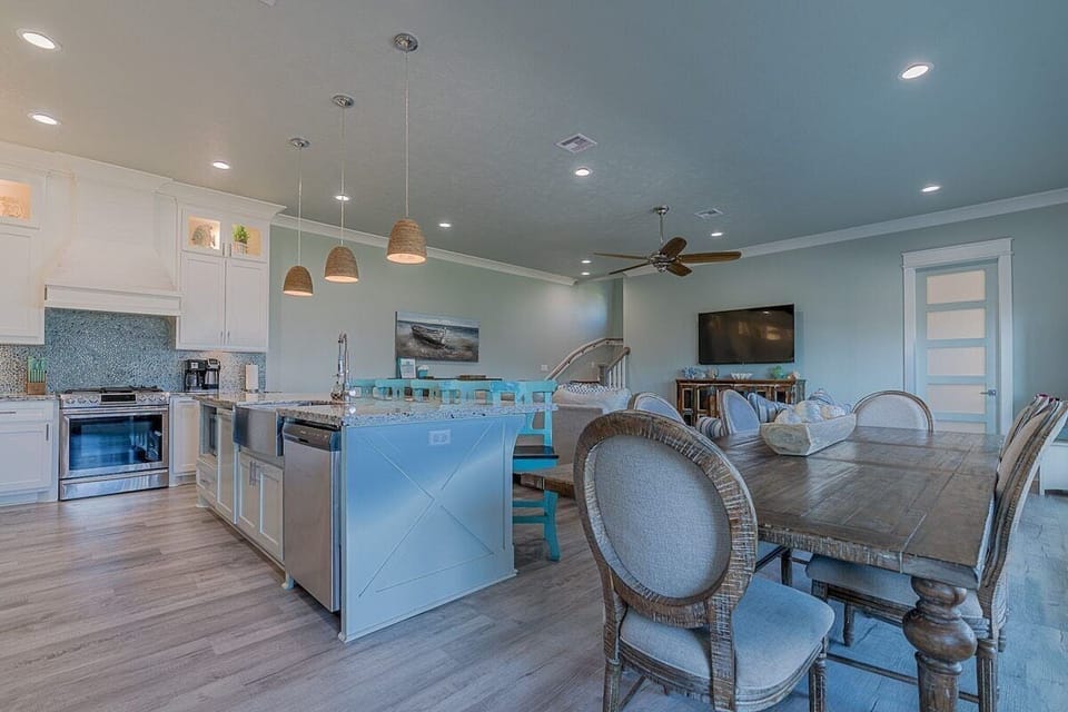 Open concept kitchen, dining, and living