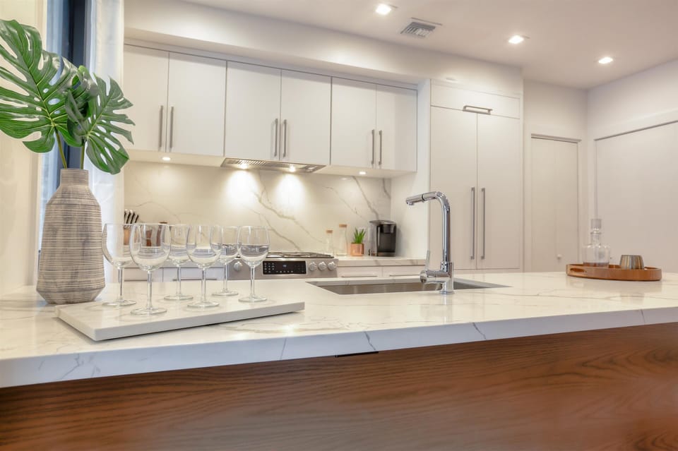 4cm Calacatta quartz waterfall countertops