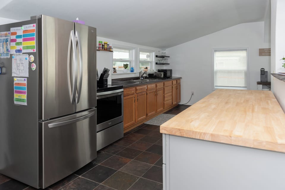 Spacious kitchen with necessities needed for a comfortable stay.