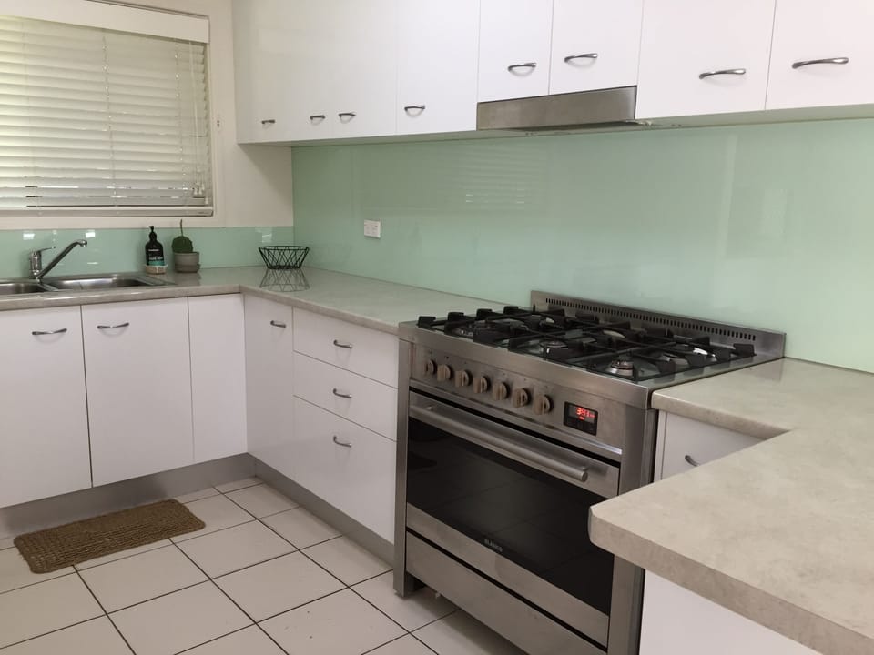 new SMEG 900mm gas cook top and electric oven with plenty of bench and storage