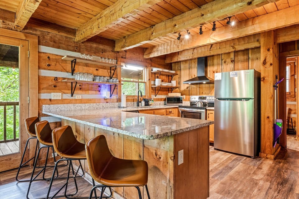 Cook a real dinner — granite counters, stainless steel everything, pantry stocked with staples.