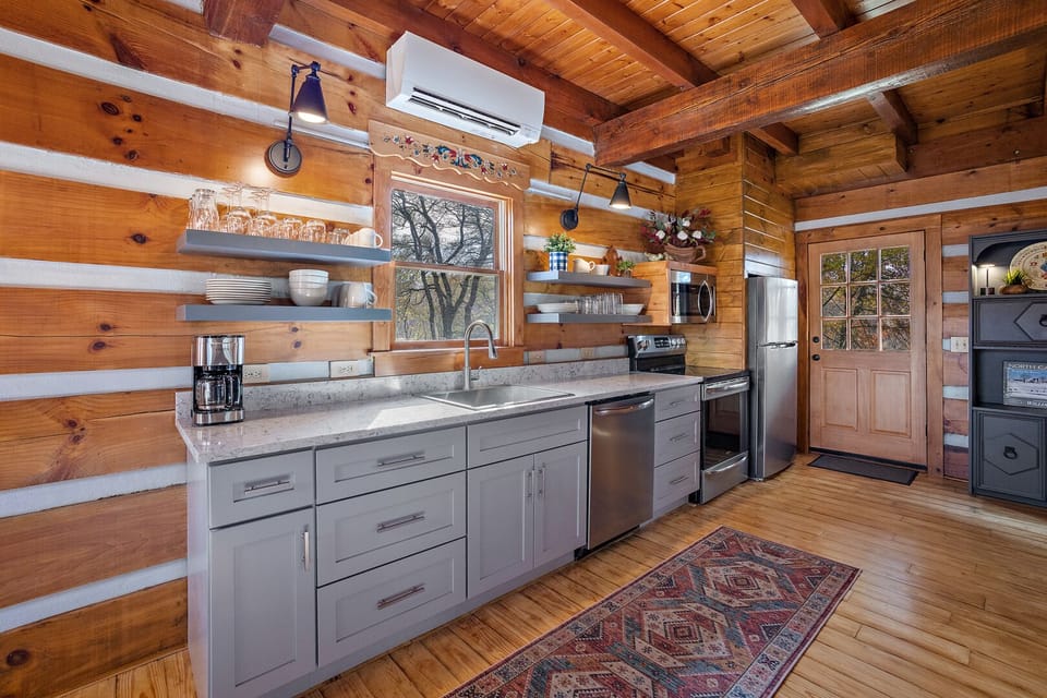 Well Equipped Open Kitchen with Quartz Countertops