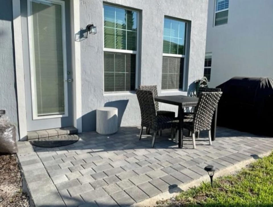 rear year with patio and BBQ