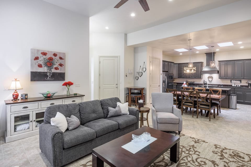 Living Room View - The Living Room is located adjacent to the dining room and is the perfect place to relax and watch your favorite movie or TV program.