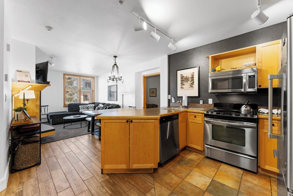 Your stylish loft features an open floor plan where you can cook gourmet meals while staying connected with guests in the living area.