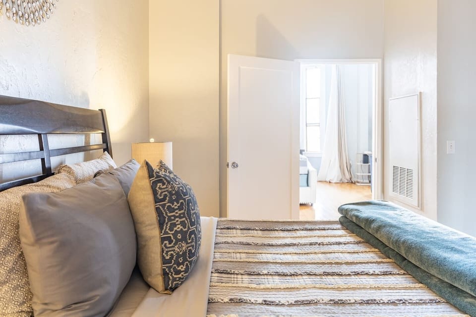 Bedroom: Includes (1) Queen bed with all pillows, linens and blankets as well a 40 inch ROKU Smart TV