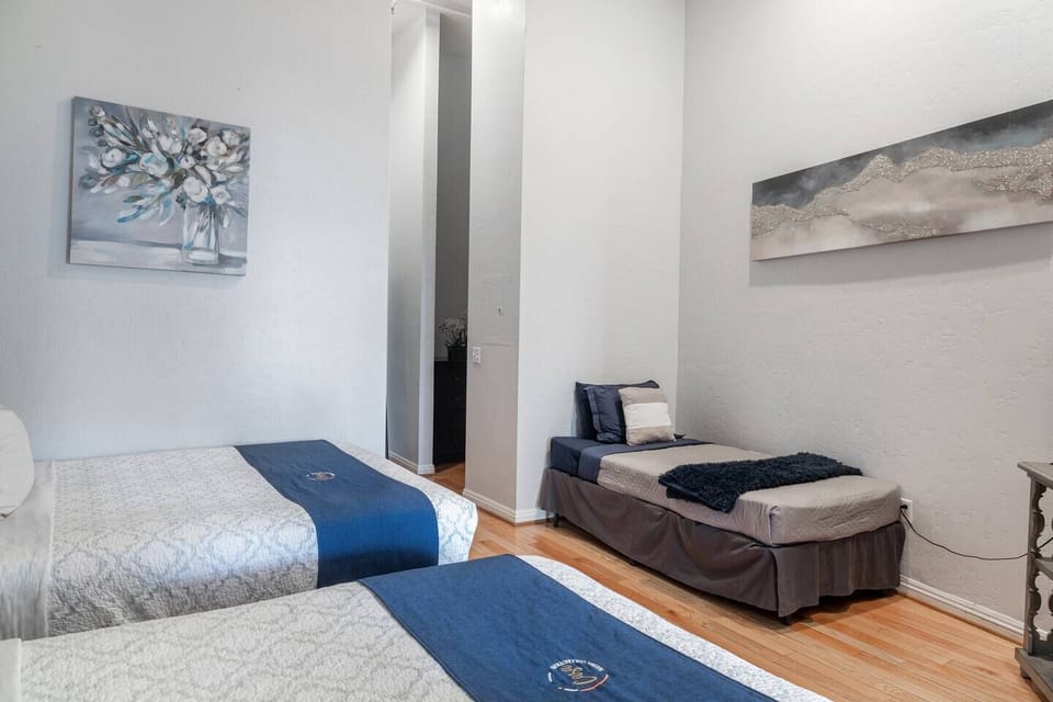 BEDROOM: Includes (2) Full beds & (1) Twin bed with all pillows, linens and blankets as well a 40 inch ROKU Smart TV
