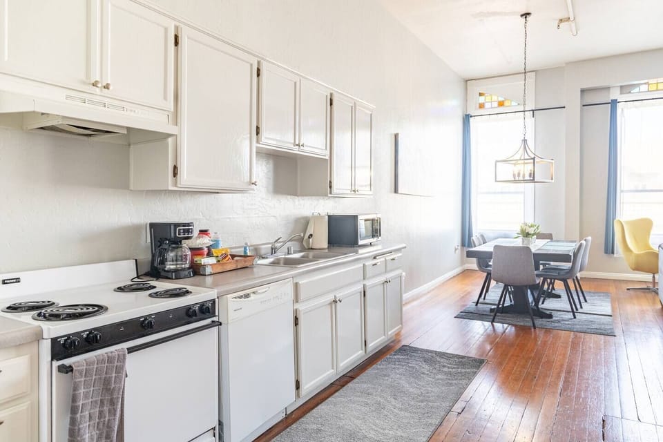 Full Kitchen includes all pots, pans, silverware, coffee maker, coffee, sugar, creamer, tea, blender, toaster, refrigerator, microwave, glasses, wine glasses and cooking/eating utensils