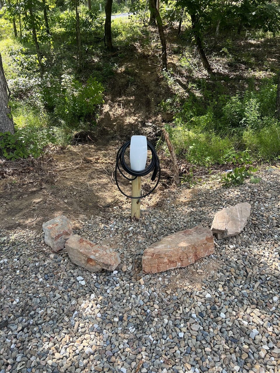 Charging Station: Power up your adventures with our convenient EV charging station in nature!