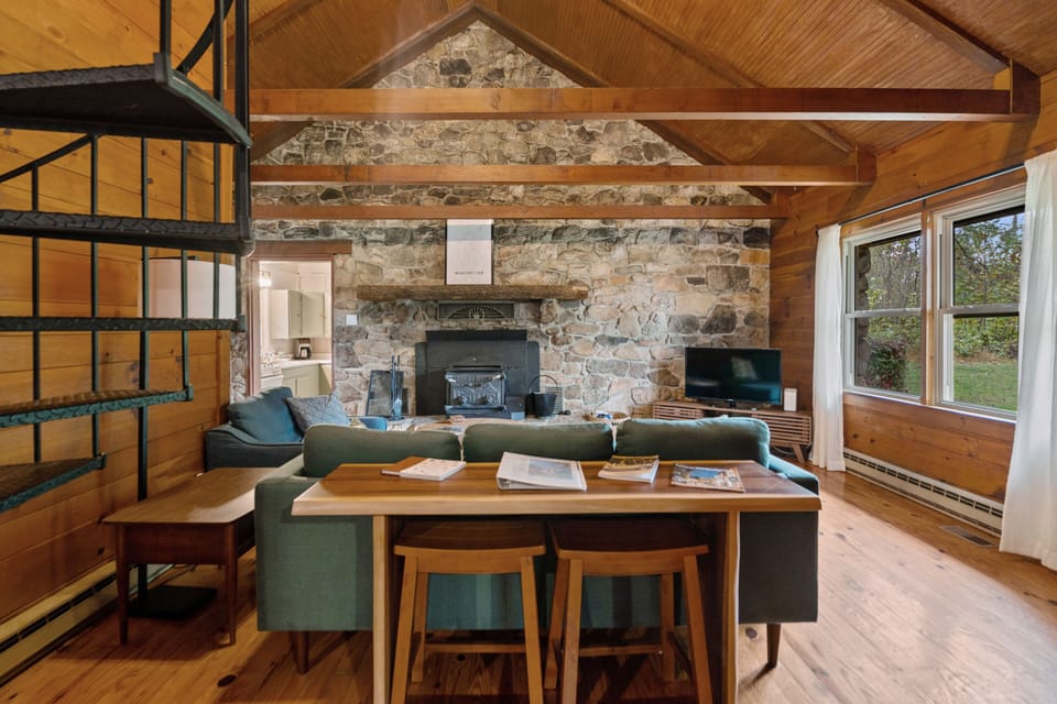 Additional seating can be found underneath the console table.