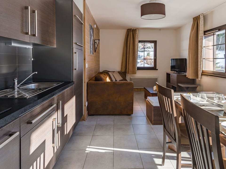 Cabinetry, Property, Furniture, Window, Countertop, Sink, Kitchen, Lighting, Wood, Flooring
