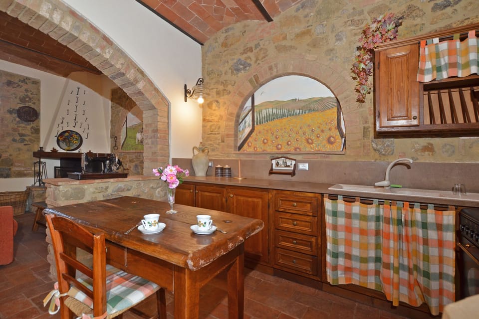 The kitchen with breakfast table