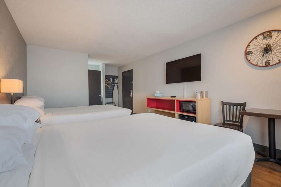 Unwind after adventures in crisp linens and quiet comfort.