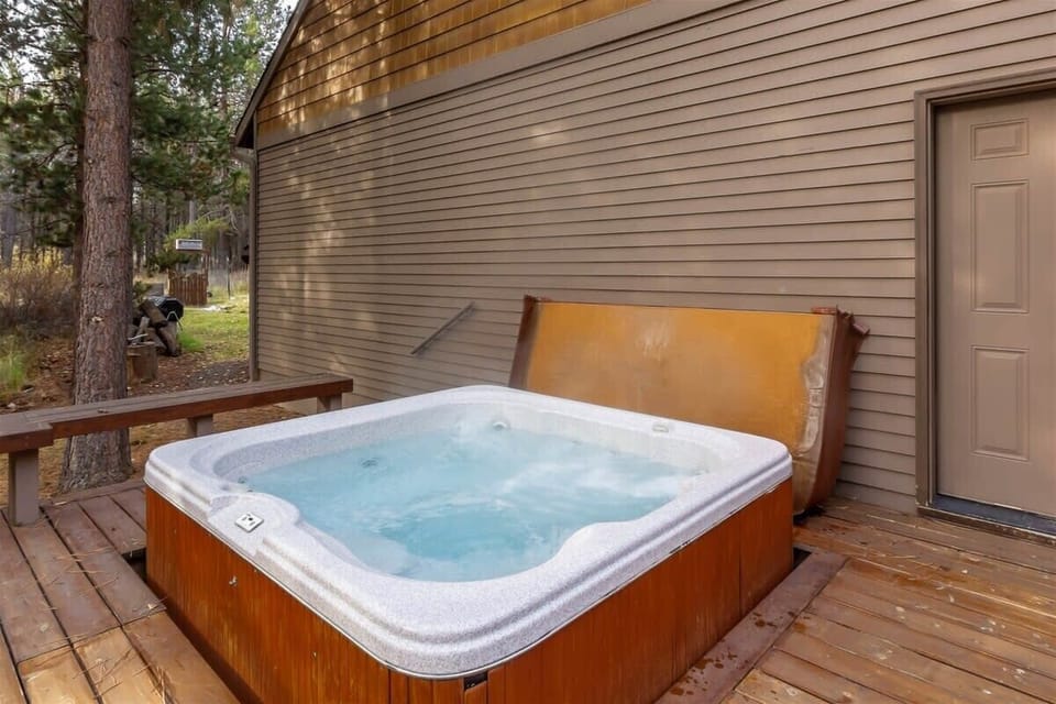 Hot tub seats 6 and is located behind the garage/Mother-in-law suite