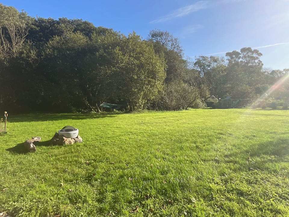 Enjoy alfresco dining with a fire pit and barbecue overlooking the meadows