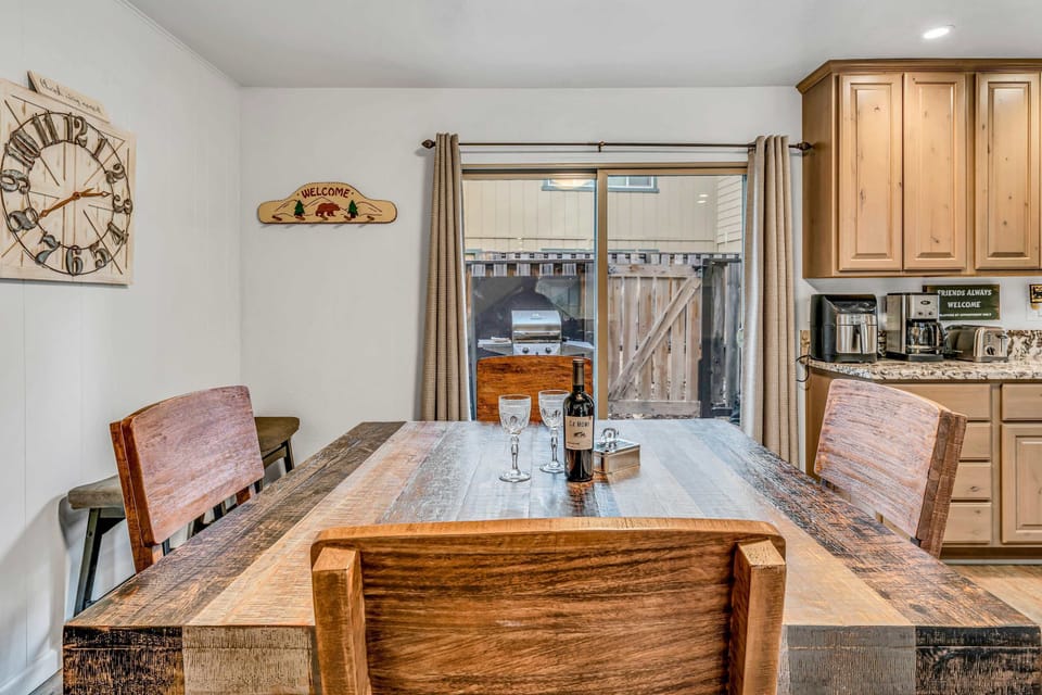 Cozy dining area perfect for family dinners, card games, and planning your next adventure.