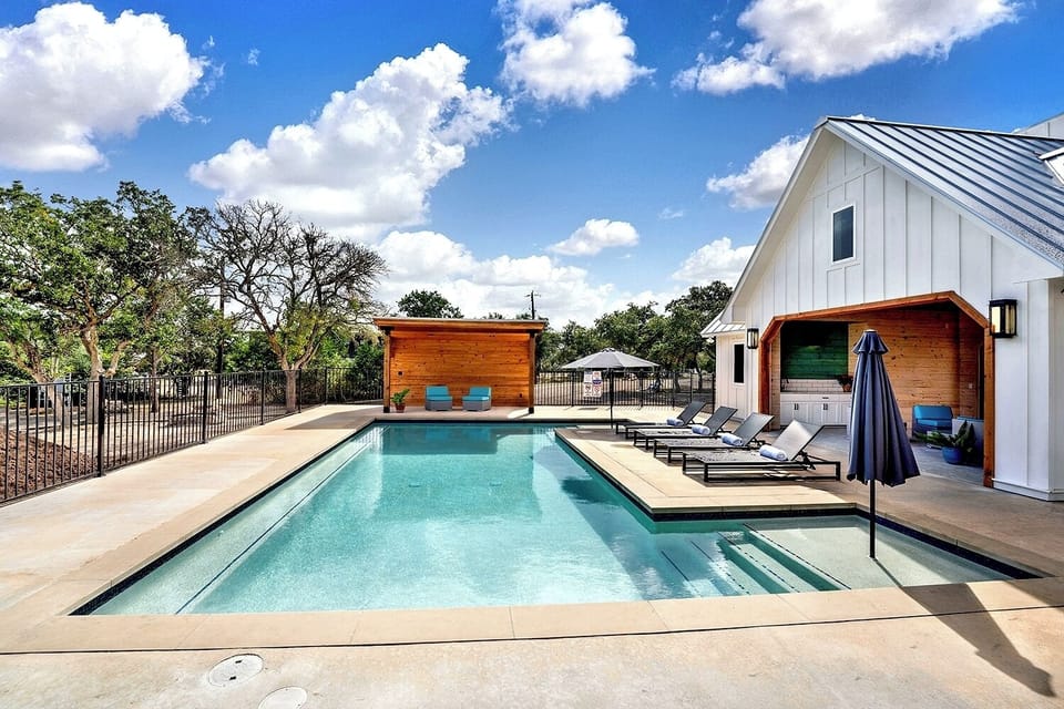 Perfect for gathering, our beautiful pool and fireplace pavilion!