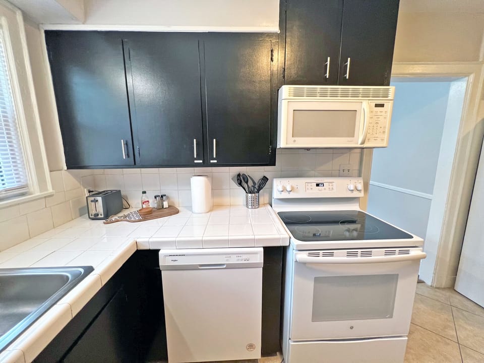 kitchen with fully stocked cooking supplies 
