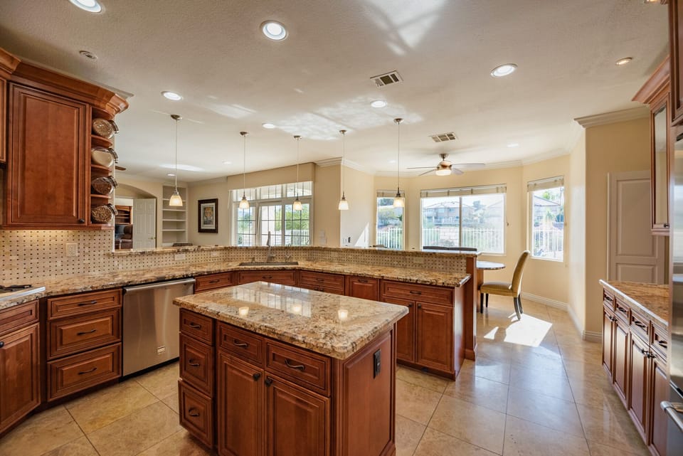 Gourmet Kitchen, Breakfast Nook and Greatroom with Views of Golf Course