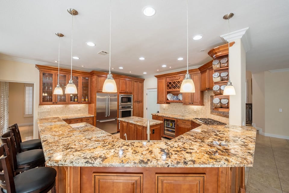 Fully Stocked Gourmet Kitchen with Built-ins, Pantry and Wine Cellar