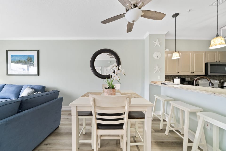 Unwind in your bright, airy space where soft coastal touches meet modern comfort—perfect for morning coffee or evening meals together.