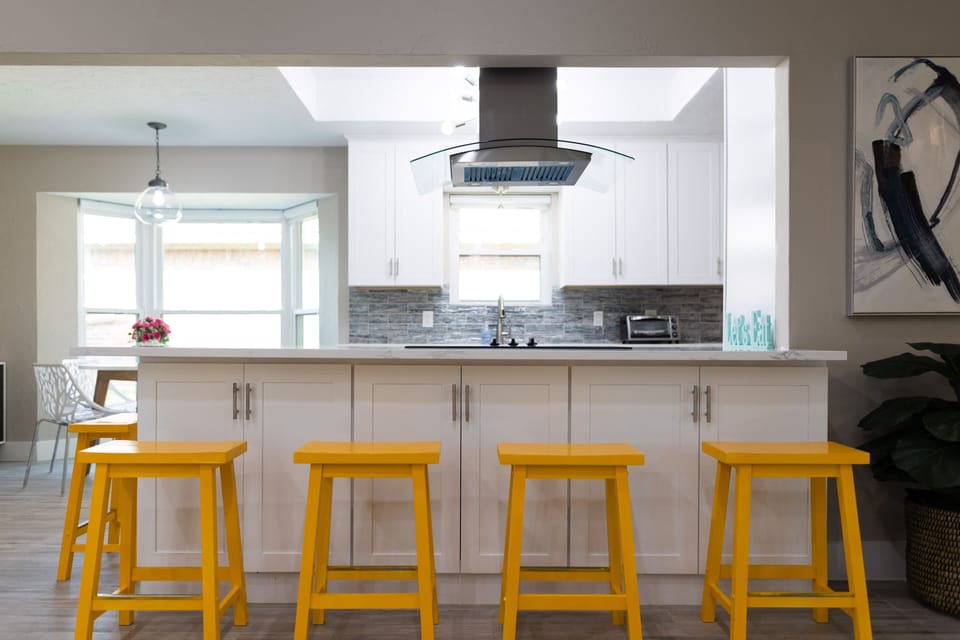 Kitchen island with bar stools
