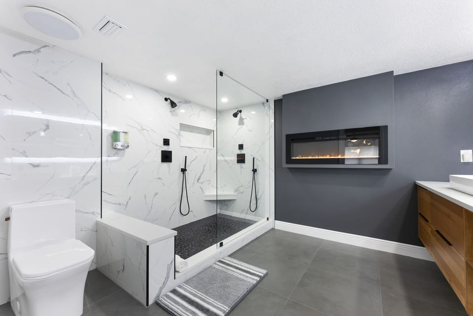 Step into our stunning, modern bathroom featuring elegant finishes.