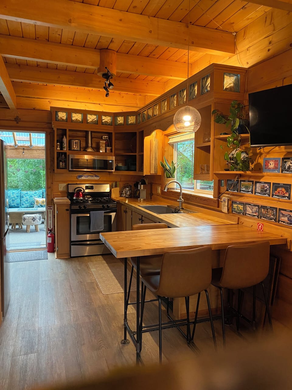 Ample counter space with a well stocked kitchen