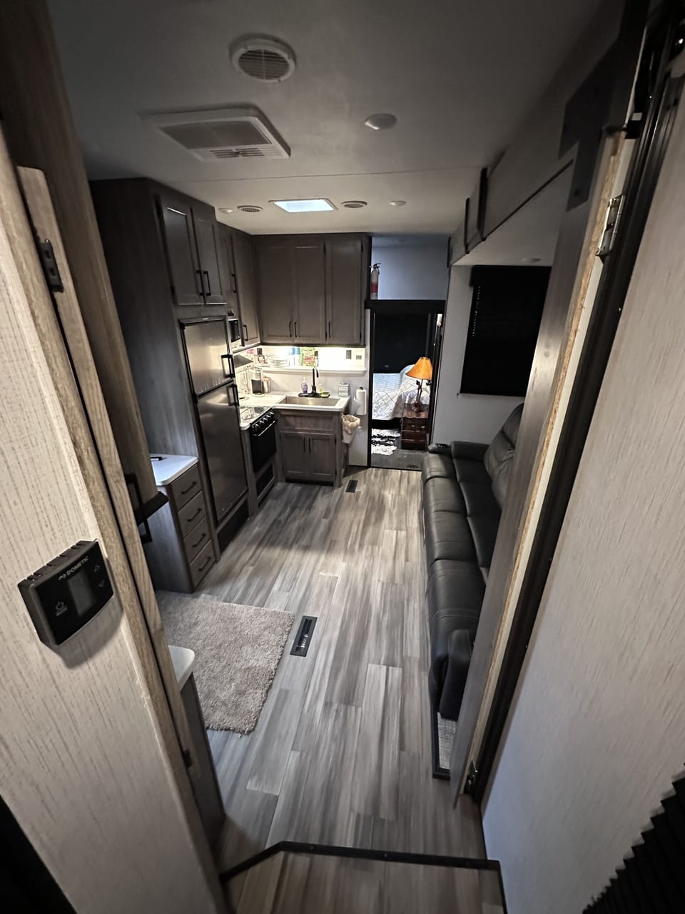 View from Private Master Suit into Living Room & Kitchen  