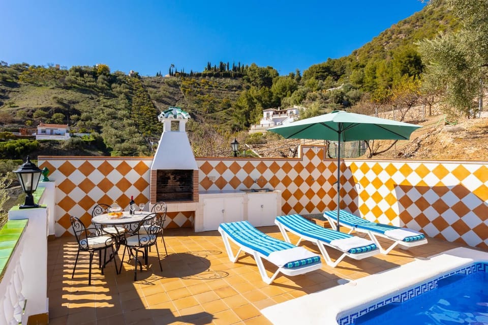 Private pool, terrace, and garden with sea views