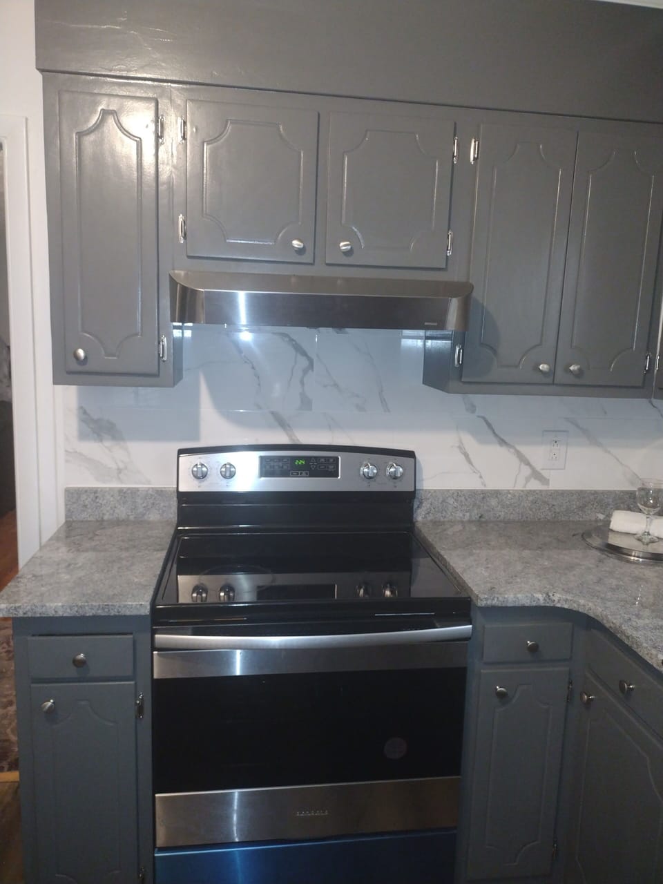 STAINLESS STEEL AND MARBLE KITCHEN