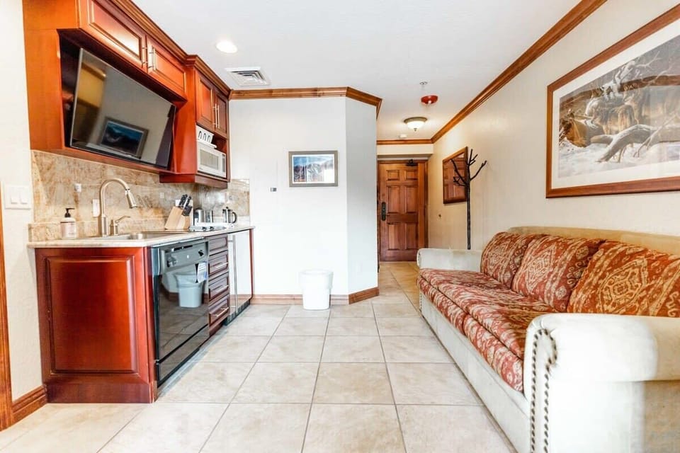 The view into the dynamic open space which can be used to cook a meal, or watch a movie while you relax on the couch.
