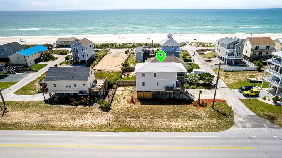 The house is on the ocean side of the main road and short walk of 150ft.