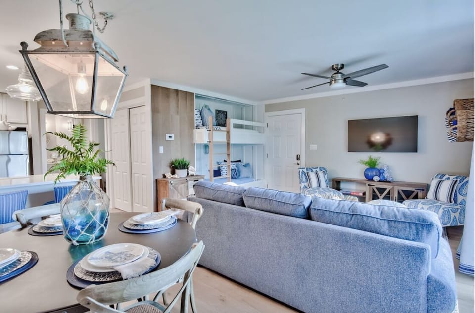Open and spacious layout with large smart TV.