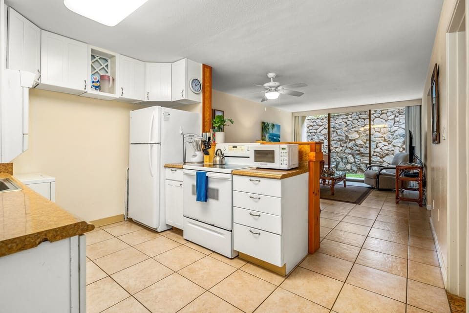 Full size fridge, range, oven & microwave