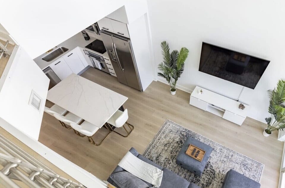 Master bedroom loft looking down to living room.