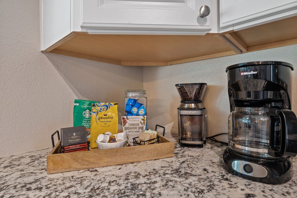 Drip coffee maker, French press, grinder, decaf, tea, creamers, stevia & sugar.