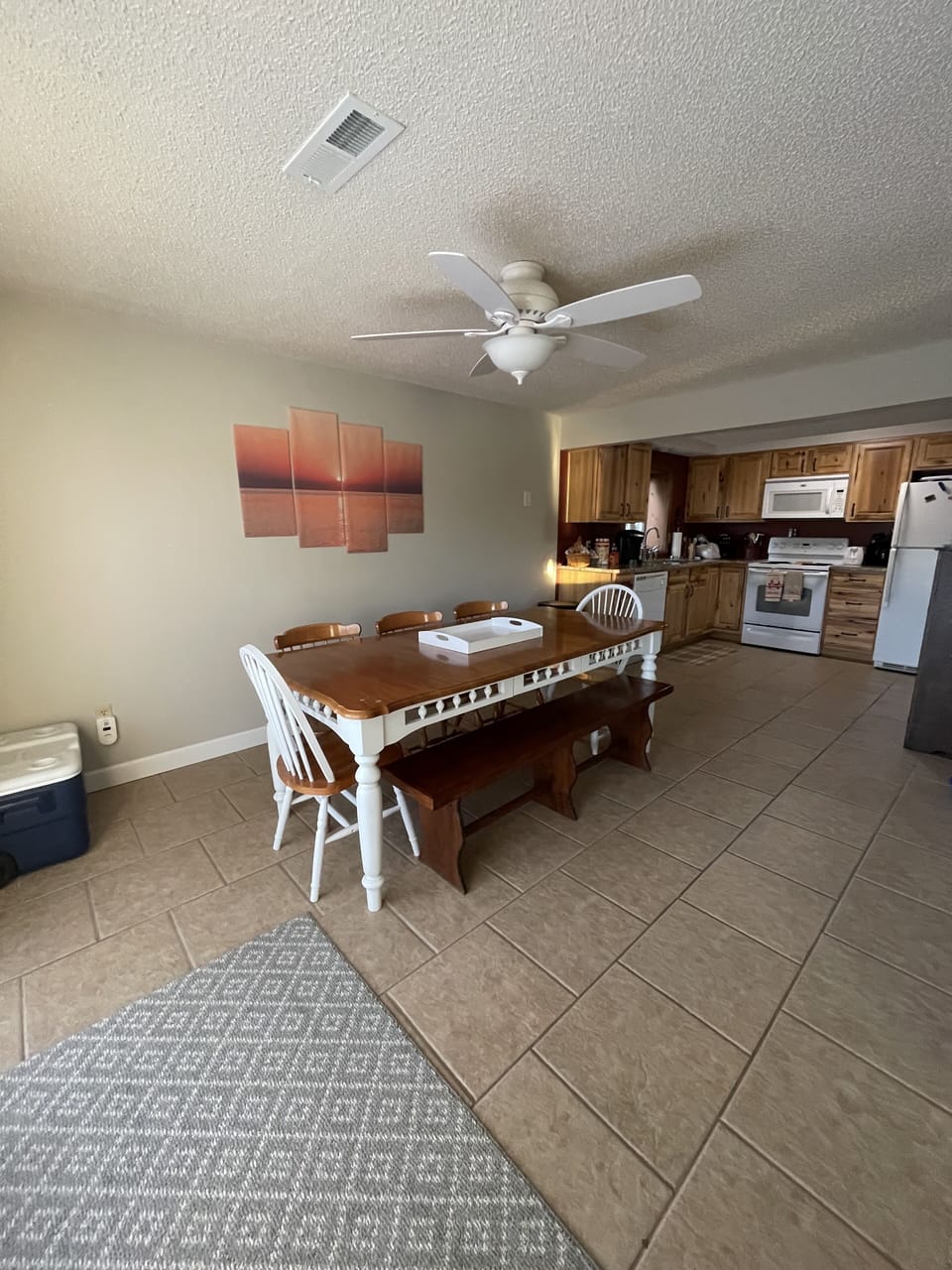 Full functioning kitchen off living room.