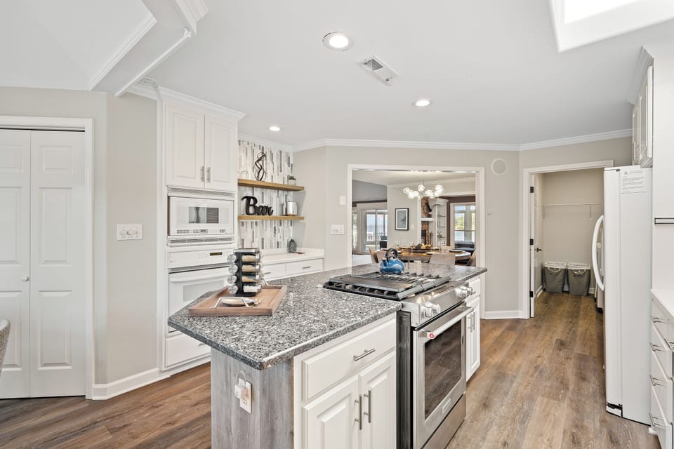 Fully stocked kitchen with island to prep all your group meals.