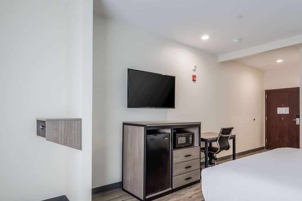 Catch up on emails easily with desk, TV, and storage.