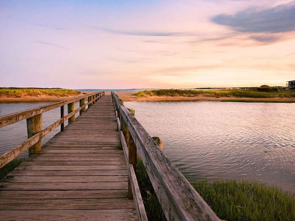 Walk to the beach from the house. Enjoy fishing off of the bridge or kayaking down the inlet. The water is very calm and there's plenty of space on the beach so that you aren't on top of someone else.
