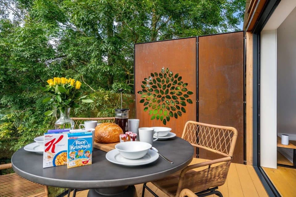 Breakfast is provided and enjoying it on the dining terrace on a sunny day is one of life's simple pleasures.