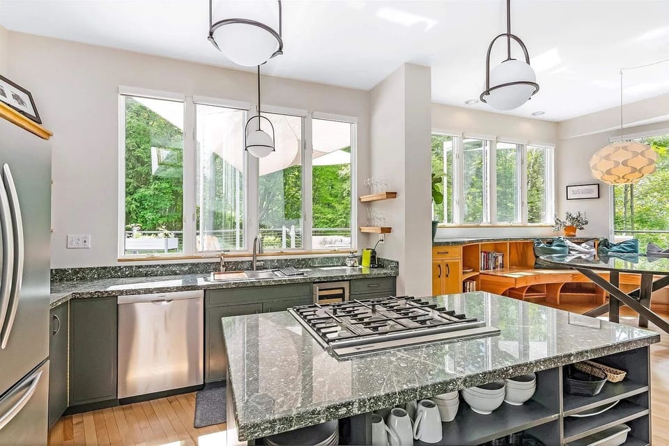 Fully stocked kitchen with island and pantry.