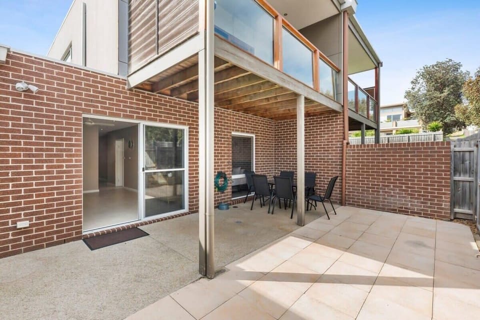 The elevated 2 storey home boasts a modern architectural design and 3 outdoor areas