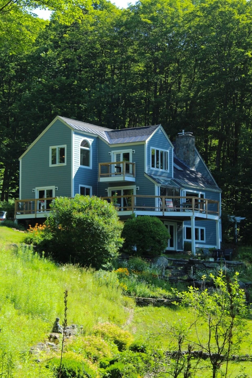 The house is on a beautiful property over 20 acres surrounding a small pond. 