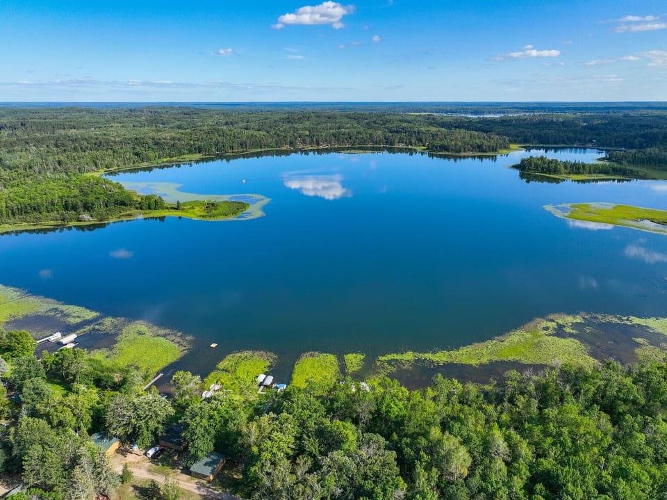 drone view of the lake above the resort