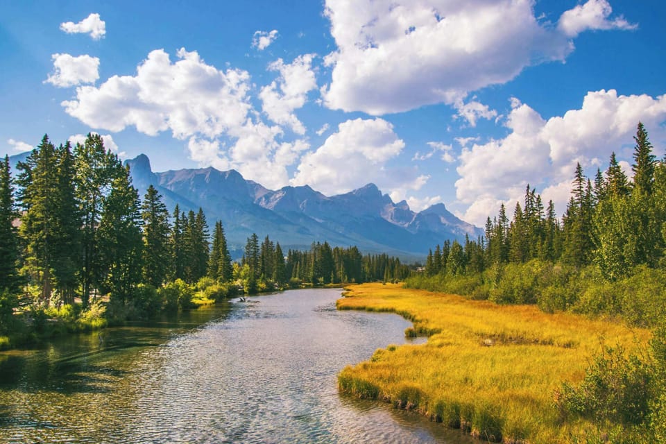 Stroll through Canmore's heart, where Policeman's Creek flows with breathtaking views of the Three Sisters.
